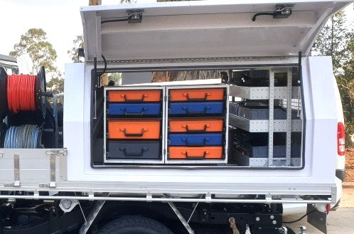 Truck bed with Rolacase storage drawers and equipment