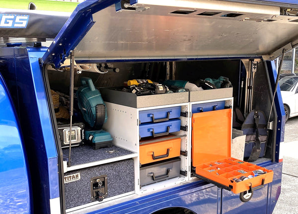 Rolacase Van interior with open tool compartments and equipment
